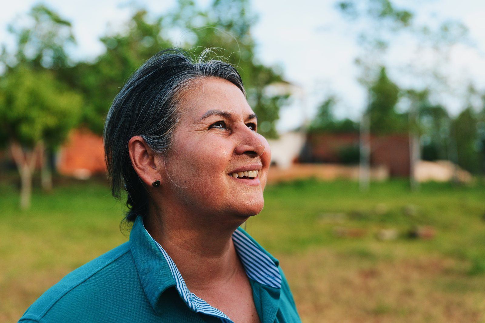 Cooperative member looking up and smiling